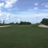 A view of a green flanked by bunkers at Clearwater Country Club.
