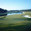 A view of a green with water coming into play at Perdido Bay Golf Club.