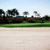 A view of a green with sand coming into play at Grand Harbor Golf & Beach Club.