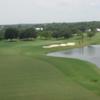 A view of fairway and green #4 at The Club at River Wilderness.