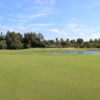 A view of a hole with water and bunkers coming into play at San Carlos Golf Club.