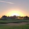 A fantastic sunrise view of the clubhouse and a green at North Palm Beach Country Club.