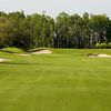 A view of the 15th green and clubhouse at Wentworth Golf Club.