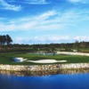 A view of the 8th hole surrounded by water and bunkers at The Conservatory Course from Hammock Beach Resort.