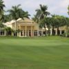 A view of a hole and the clubhouse at Madison Green Country Club.