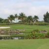 A view of a green with water coming into play at Madison Green Country Club.