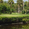 A view over the water of a hole at Jupiter Dunes Golf Course.