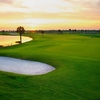 A sunrise view of a green with water coming into play from left (Jason Myers)