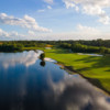 Aerial view of the 3rd fairway and green at The Cape Club of Palm City.