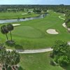 Aerial view of green #8 protected by bunkers at Osprey from Okeeheelee Golf Course