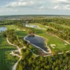 Aerial view of the 10th green on the right side, 11th fairway and green in the middle and the 13th fairway on the left