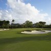 A view of green protected by bunkers at Pine Tree Golf Course