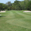 A view of the 5th green protected by bunkers at Boca Royale Golf & Country Club