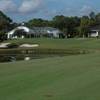 A view of the 2nd green protected by bunkers at Sugar Mill Country Club - Red Course