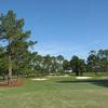 A view of green 8 protected by bunkers at Seminole Legacy Golf Club