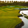 A view of green surrounded by bunkers from Rookery At Marco