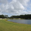 The fifth hole at The Club at Venetian Bay is reachable in two, but it plays around a lake.