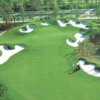 Aerial view of green protected by bunkers at Frenchman's Reserve Golf Course