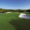 A view of green #1 protected by bunkers at Lone Palm Golf Club.