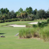 A view of a green protected by bunkers at Candler Hills Golf Club