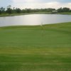 View of the 18th hole and the lake in the background at Bluffs Golf Course