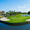 A view of a green surrounded by water at The Boca Raton