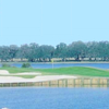 A view over the water of a green at Cane Garden Country Club