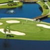 A view of a green surrounded by water at Mariner Sands Country Club