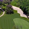 Aerial view of a green protected by a bunker from The Club at Eaglebrooke