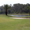 A view of a hole protected by a bunker at Glen Abbey Golf Club (SportsVolusia)