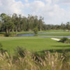 A view of a hole with water in background at Mayacoo Lakes Country Club