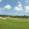 A view of a green protected by bunkers at Jupiter Hills Club