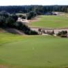A view of a green protected by sand traps at World Woods Golf Club