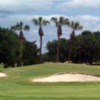 A view of a green protected by sand traps at Countryway Golf Club