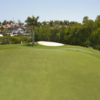 A view of a green protected by bunkers at Windstar on Naples Bay
