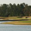 A view over the water of the 18th green at St. Johns Golf & Country Club