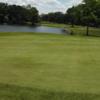 A view of a green with water coming into play at Sherwood Golf Club