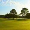 A sunny day view of a hole at Legacy Golf Club.