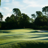 View of a green and fairway at St. Lucie Trail Golf Club