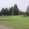 A view of a green protected by tricky bunkers at Indian Lake Estates Golf & Country Club