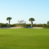 A view of a green with bunker at Viera East Golf Club