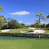 A view of a hole surrounded by tricky bunkers at Adios Golf Club