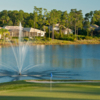 View of a green and lake at DeBary Golf and Country Club