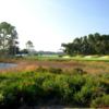 A view of green #6 protected by bunkers at Shark's Tooth Golf Club.