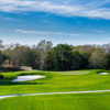 A view of a green protected by sand traps from Esplanade Golf & Country Club at Lakewood Ranch