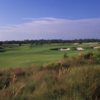 A view of a green protected by sand traps at Golf Club of the Everglades