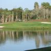 A view over the water of a hole at Alaqua Country Club