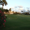 A view of the clubhouse and a well protected hole at Palm Beach Country Club