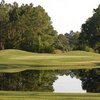 A view over water of green at St. Johns Golf Club