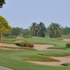 A view of green surrounded by bunkers at Winston Trails Golf Club
